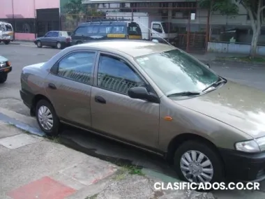 cambio lindo mazda 323 1999 por 4x4