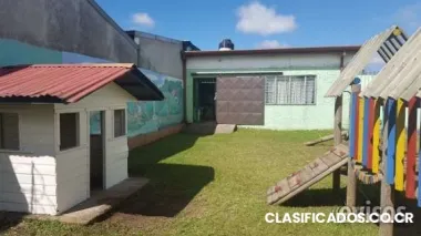 Lote y casa comercial