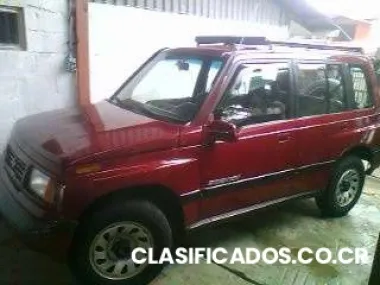 Suzuki sidekick95,,color vino,,todo al dia...
