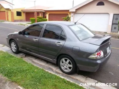 Vendo automóvil mitsubishi lacer, como nuevo