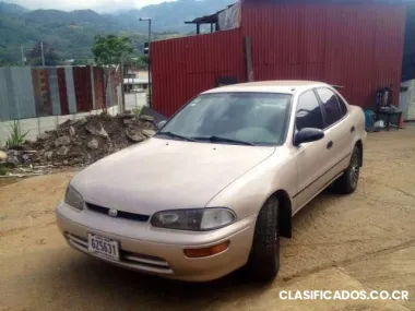Vendo carro geo prizm modelo 95 aros de lujo exc estado