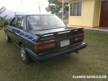 Vendo nissan centra resivo moto sukida200...... o ....susuki 150