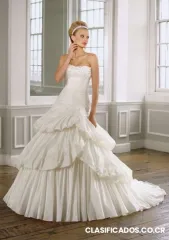 Vestido de novia, usado solamente una vez.