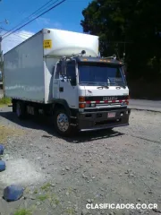 Bodega con camión para servicio de encomiendas