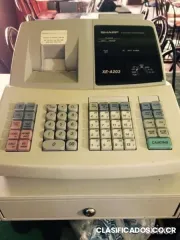 Se vende caja registradora sharp xe - 203