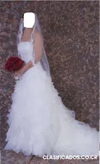 Vendo vestido de novia usado una vez talla 8 u.s.a. de disenadora tipo espanol