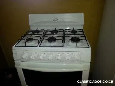 Cocina atlas nueva de gas 6 discos y horno